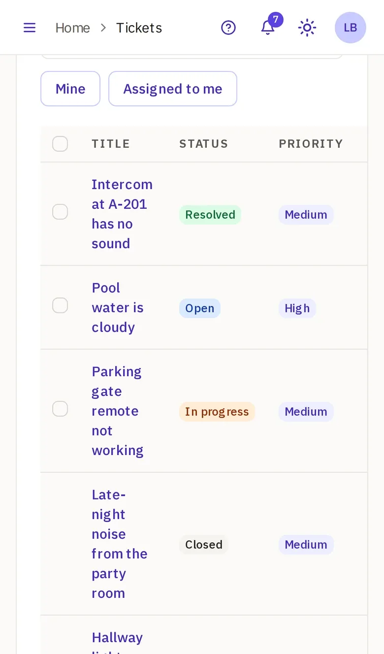 The tickets list on a phone, with Mine and Assigned to me, and each ticket’s title, status and priority.