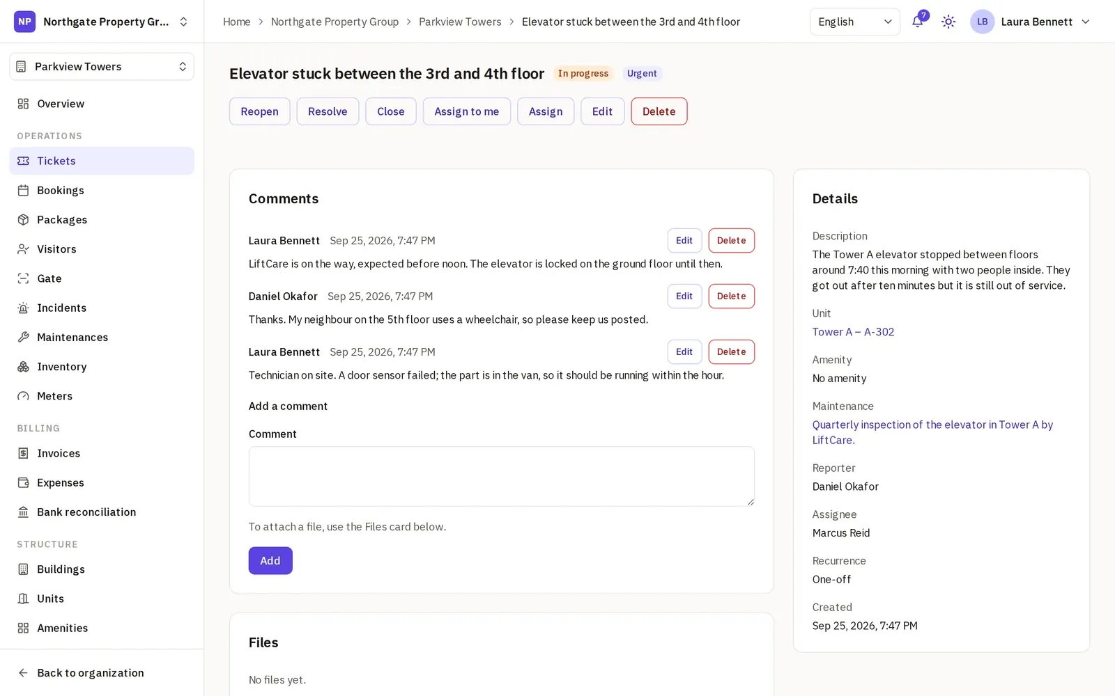 A ticket page: the elevator stuck between two floors, urgent and in progress, with its comments, its unit, the maintenance it belongs to, the reporter and the assignee.